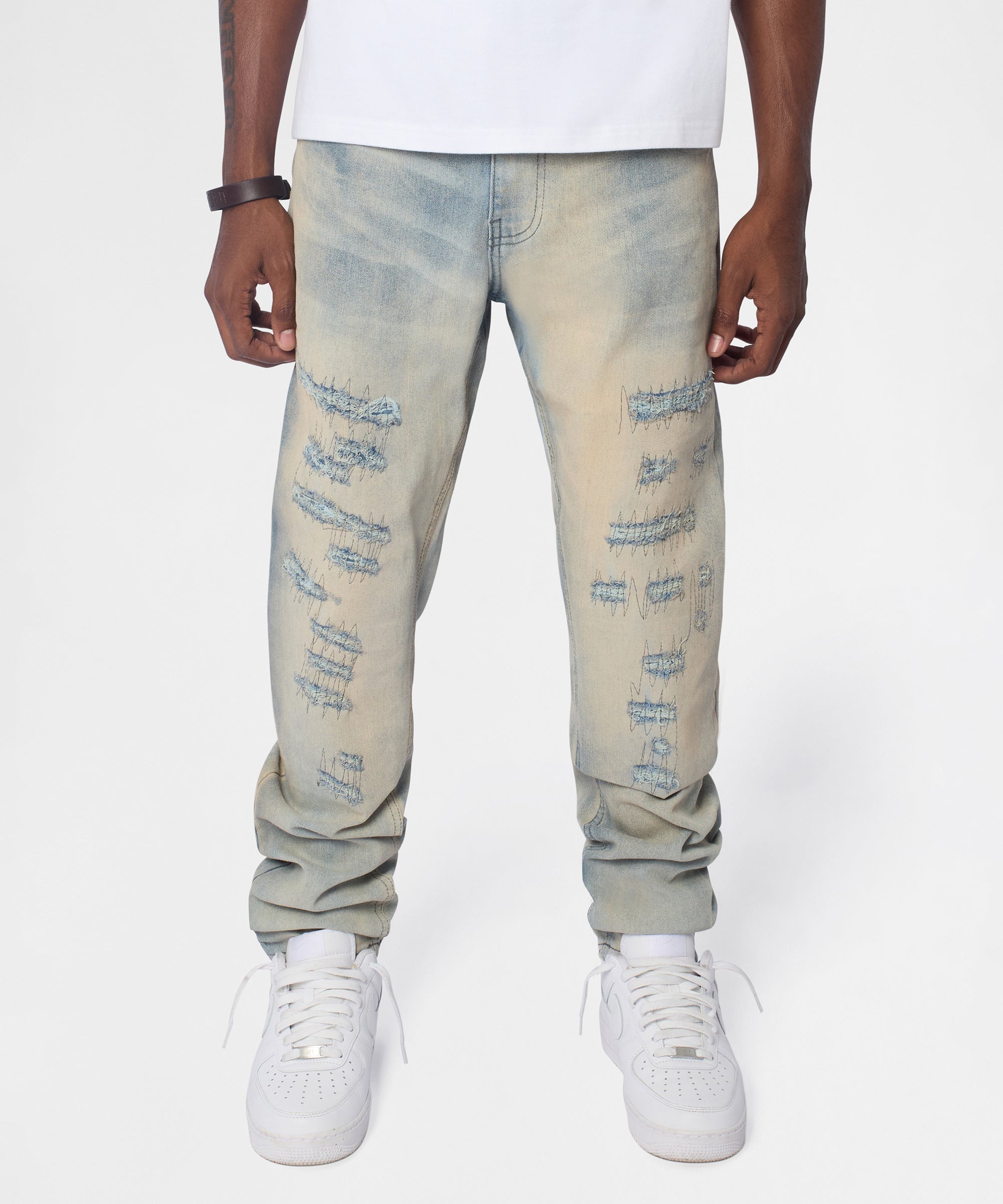 Light Wash Repaired Denim Jeans - Blue