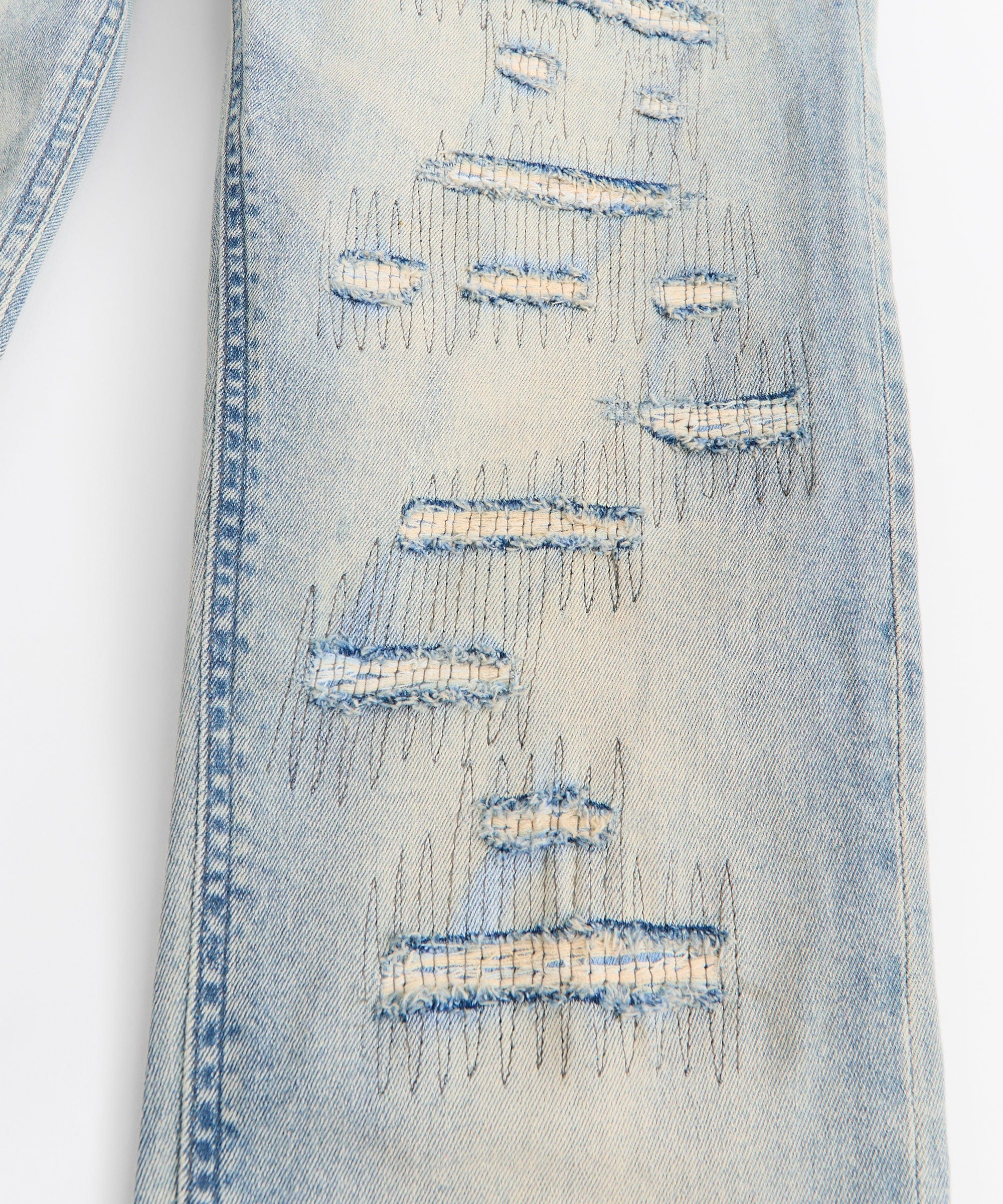 Light Wash Repaired Denim Jeans - Blue